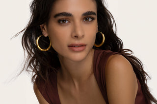 Gioielli snake: consigli di stile e significato del simbolo del serpente