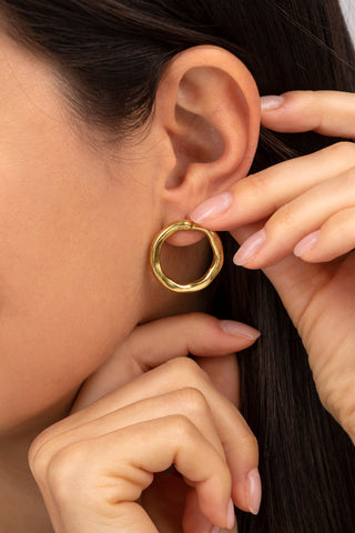 ORECCHINI TONDI BATTUTI